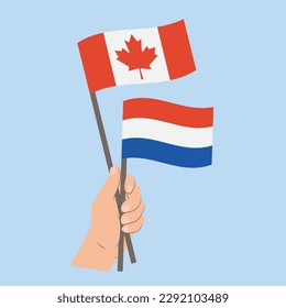 Banderas de Canadá y los Países Bajos, banderas de mano