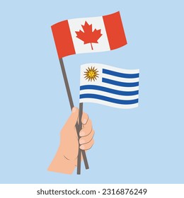 Banderas de Canadá y Uruguay, banderas de mano