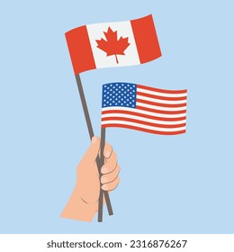 Flags of Canada and USA, Hand Holding flags