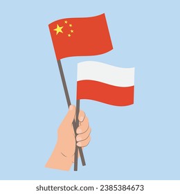 Banderas de China y Polonia, con banderas de mano