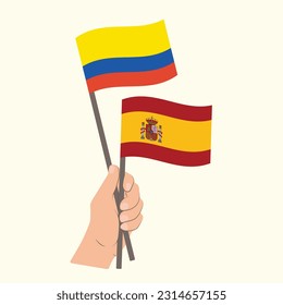 Flags of Colombia and Spain, Hand Holding flags