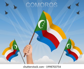 The flags of the comoros Fly under the blue sky