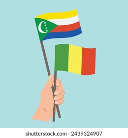 Flags of Comoros and Mali, Hand Holding flags
