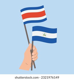 Flags of Costa Rica and Nicaragua, Hand Holding flags