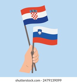 Flags Croatia and Slovenia, Hand Holding flags