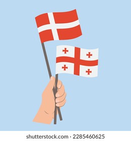 Banderas de Dinamarca y Georgia, Banderas con manos