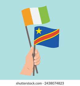 Flags of Côte d'Ivoire and Madagascar, Hand Holding flags