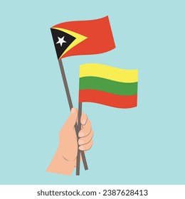 Banderas de Timor Oriental y Lituania, banderas con mano