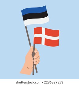 Banderas de Estonia y Dinamarca, banderas con mano
