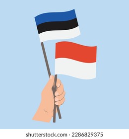 Flags of Estonia and Monaco, Hand Holding flags
