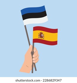 Flags of Estonia and Spain, Hand Holding flags

