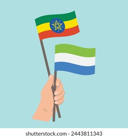 Flags of Ethiopia and Sierra Leone, Hand Holding flags