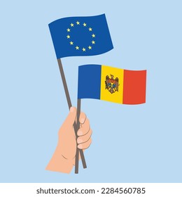 Flags of EU and Moldova, Hand Holding flags