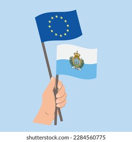 Flags of EU and San Marino, Hand Holding flags