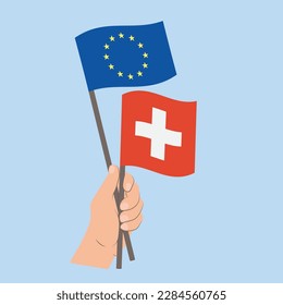Flags of EU and Switzerland, Hand Holding flags