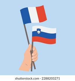 Flags of France and Slovenia, Hand Holding flags