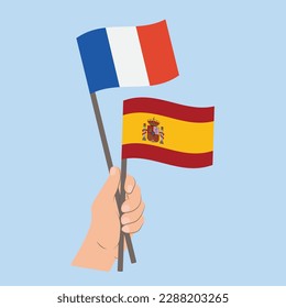 Flags of France and Spain, Hand Holding flags