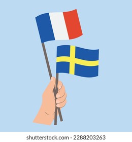 Flags of France and Sweden, Hand Holding flags