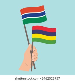 Flags the Gambia and Mauritius, Hand Holding flags
