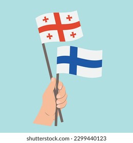 Flags of Georgia and Finland, Hand Holding flags