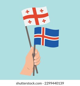 Flags of Georgia and Iceland, Hand Holding flags