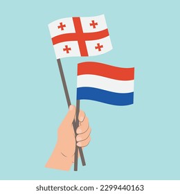 Banderas de Georgia y los Países Bajos, banderas de mano