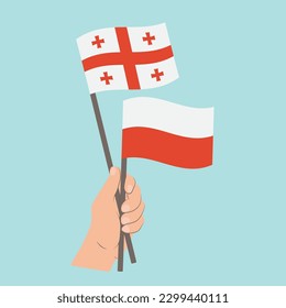 Flags of Georgia and Poland, Hand Holding flags