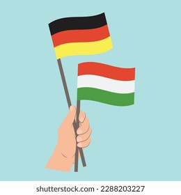 Banderas de Alemania y Hungría, con banderas de mano