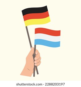 Flags of Germany and Luxembourg, Hand Holding flags