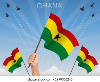 Las banderas de ghana están ondeando bajo el cielo azul