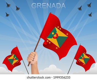 The flags of Granada flutter under the blue sky