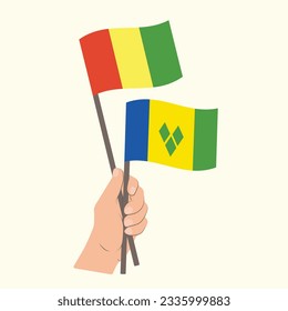 Flags of Guinea and Saint Vincent and the Grenadines, Hand Holding flags
