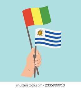 Flags of Guinea and Uruguay, Hand Holding flags