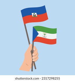 Flags of Haiti and Equatorial Guinea, Hand Holding flags