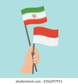 Flags of Iran and Indonesia, Hand Holding flags