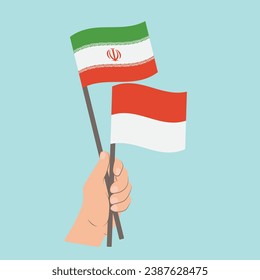 Flags of Iran and Monaco, Hand Holding flags