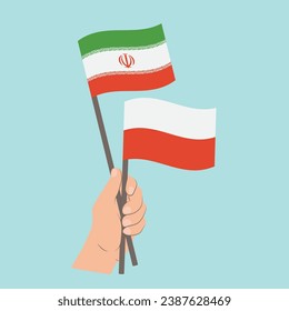 Banderas de Irán y Polonia, con banderas de mano