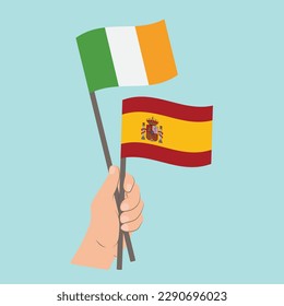 Flags of Ireland and Spain, Hand Holding flags