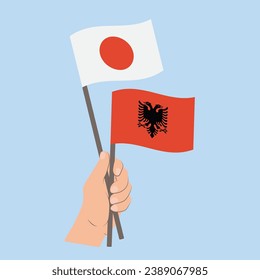 Flags of Japan and Albania, Hand Holding flags