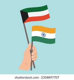 Banderas de Kuwait y la India, portadoras de la mano