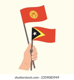 Flags of Kyrgyzstan and East Timor, Hand Holding flags