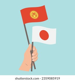 Flags of Kyrgyzstan and Japan, Hand Holding flags