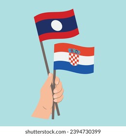 Flaggen von Laos und Kroatien, handgeführte Flaggen