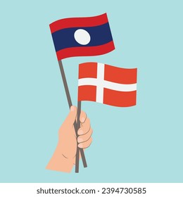 Banderas de Laos y Dinamarca, con banderas de mano