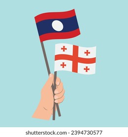 Flags of Laos and Georgia, Hand Holding flags