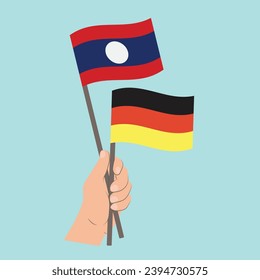 Flags of Laos and Germany, Hand Holding flags