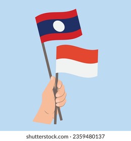 Flags of Laos and Indonesia, Hand Holding flags