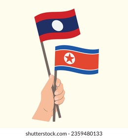 Flags of Laos and North Korea, Hand Holding flags