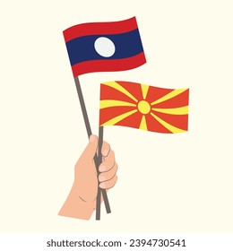 Flags of Laos and North Macedonia, Hand Holding flags