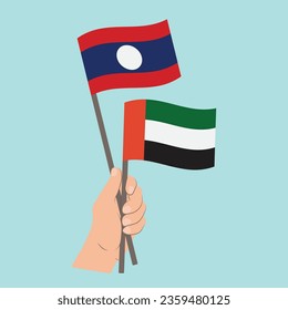 Banderas de Laos y Emiratos Árabes Unidos, portadoras de banderas